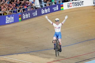 Emma Finucane celebrates taking the women's sprint world title