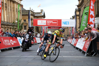 Thomas Mein leads Matt Bostock through a corner at the inaugural Newcastle Crit.