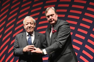 Jon Miles is presented with a Gold Badge of Honour at the 2023 British Cycling Awards in Manchester